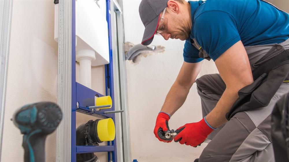 Installing wall mounted toilet